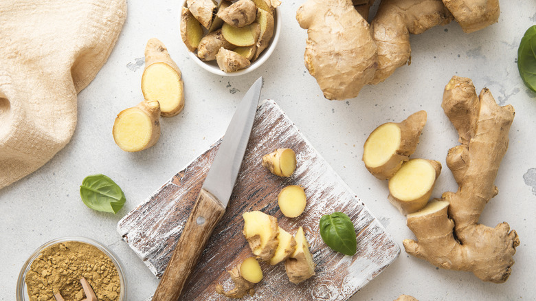 Raw fresh ginger knife slices