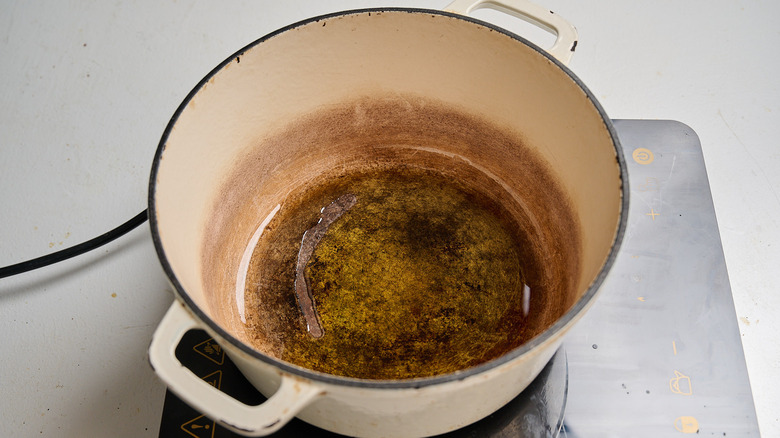 heating oil in a pot