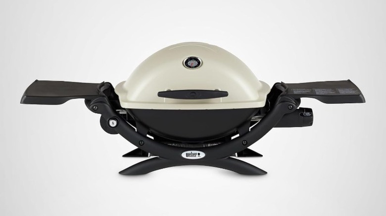 The Weber Q1200 Liquid Propane Portable Gas Grill in white