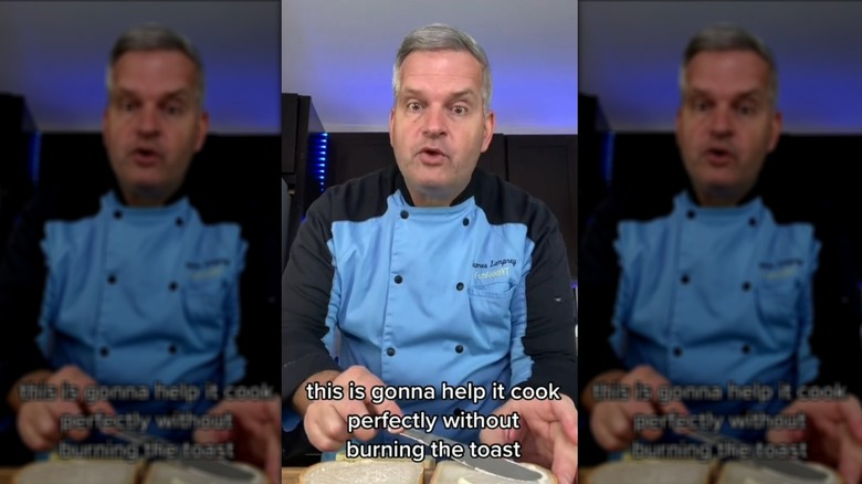 Man spreading mayonnaise onto bread