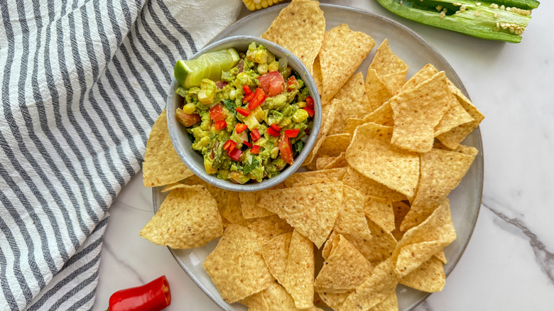 platter with chips and guacamol