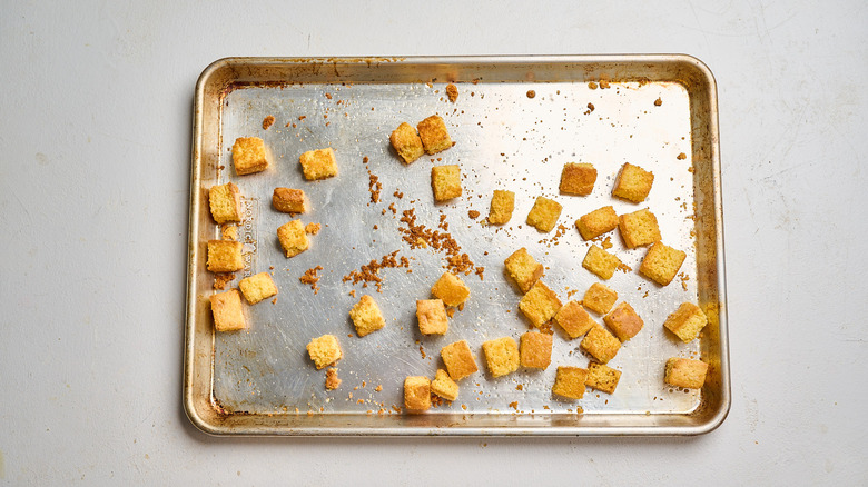 baked croutons on a sheet tray