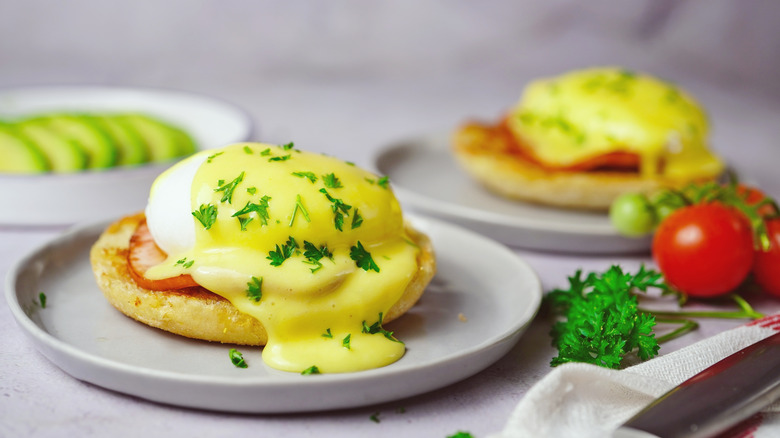 eggs benedict with green onions
