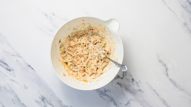 Grilled salmon salad in big bowl