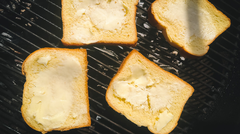 Grilling bread on grill