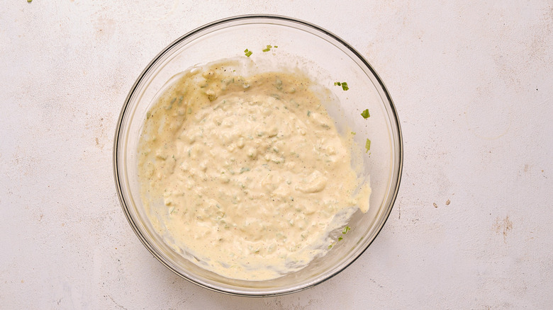 mixing remoulade sauce in a bowl