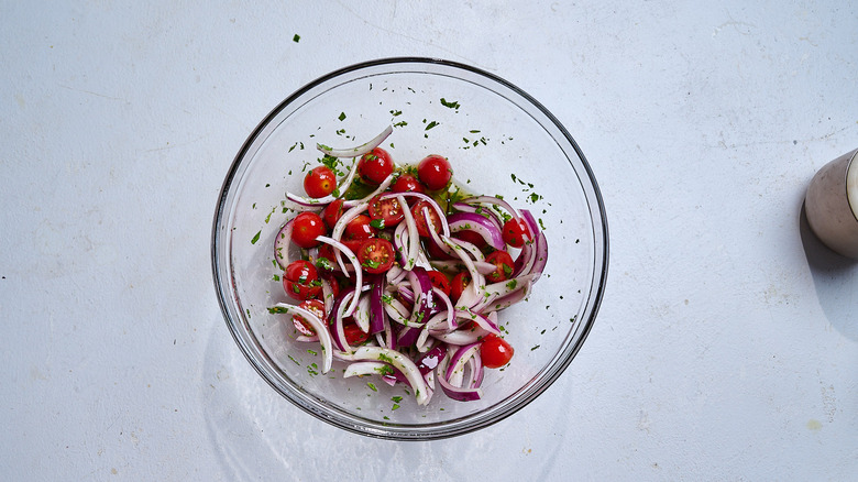 tomato salad combined in a bowl