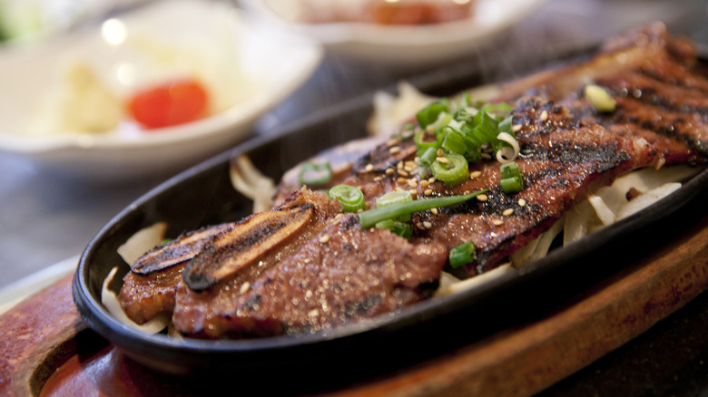 korean short ribs on a cast iron pan