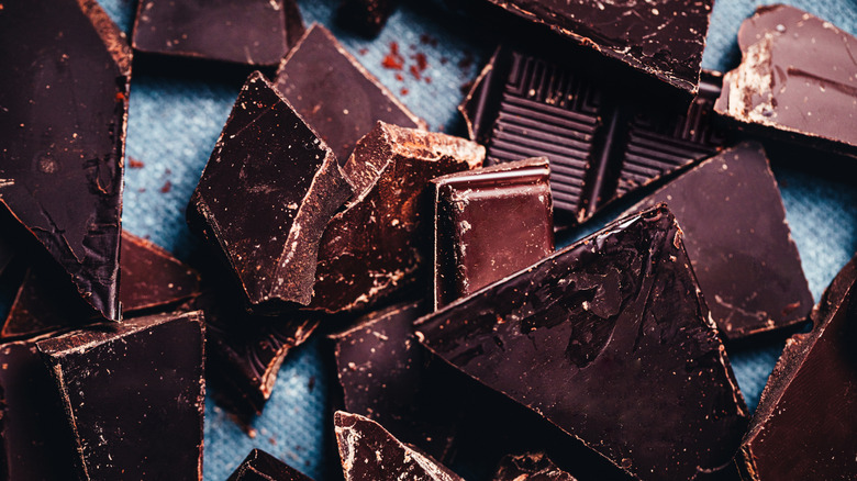 Close-up of pieces of raw chocolates on kitchen counter