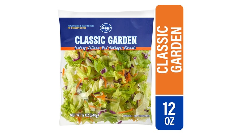 A beauty shot of Kroger's Classic Garden salad mix with iceberg lettuce, red cabbage, and carrots