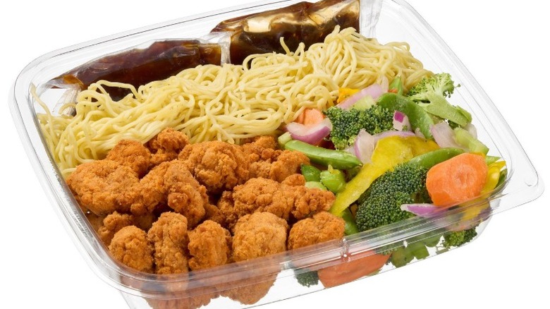 A container of Kirkland Signature Honey Sesame Chicken Stir Fry Meal Kit available at Costco