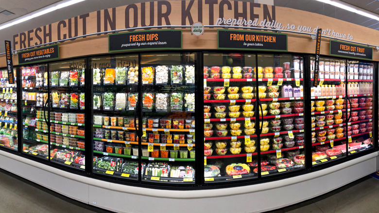 A panorama of a refrigerator isle