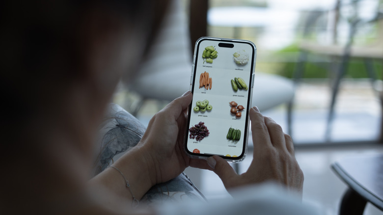 person using grocery app