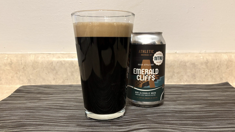 Emerald Cliffs in can and pint glass on bar mat