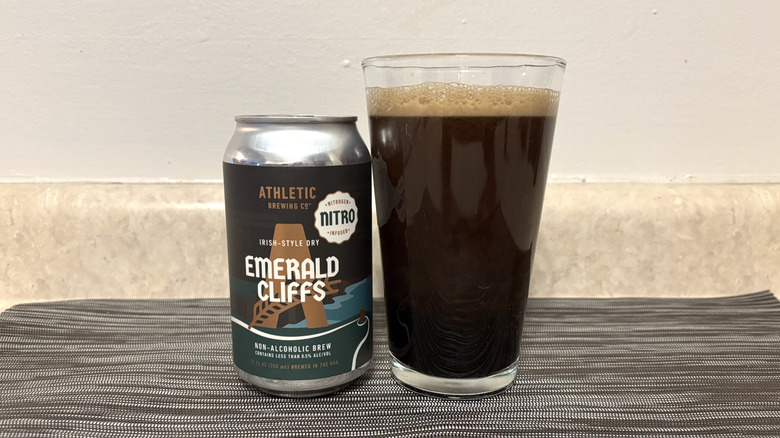 Emerald Cliffs in can and pint glass on bar mat