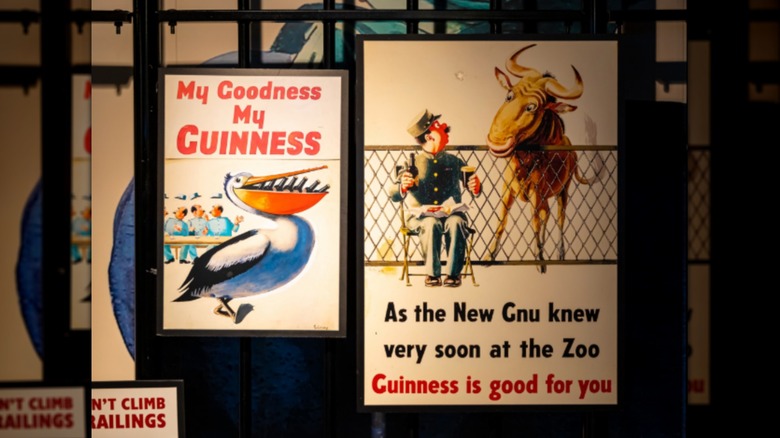 Two vintage signs advertising Guinness beer