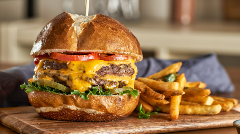 Double cheeseburger on a pretzel bun