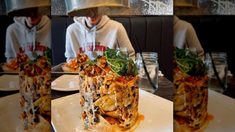 trash can nachos tower at a Flavortown restaurant