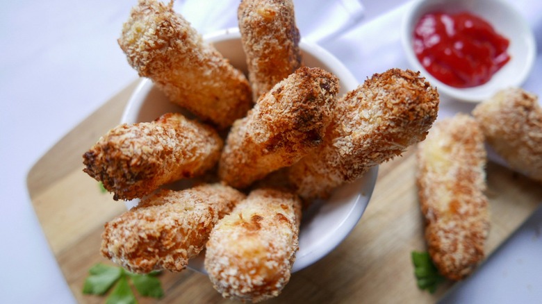 fried cheese sticks with ketchup