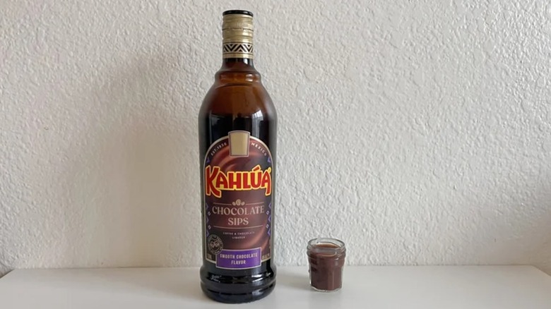 Bottle and shot glass of Chocolate Sips liqueur