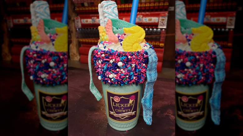 Coral Reef King Shake topped with sour candy, gummy candy, sprinkles, and whipped cream