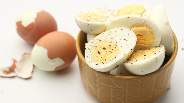 peeled, halved, and whole boiled eggs