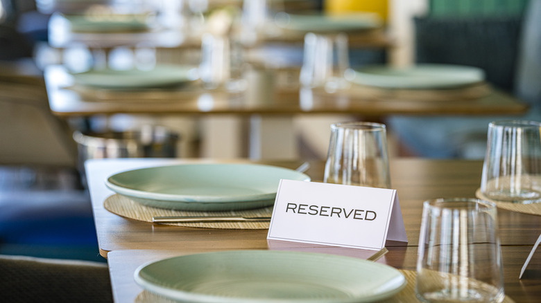 Reserved sign on restaurant table