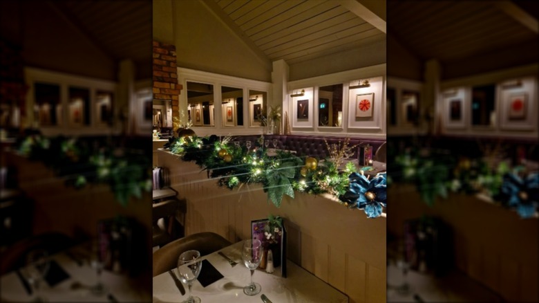 Dining room with tables at Grace Neill's