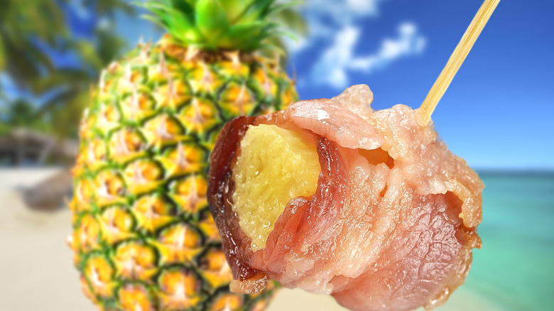 Bacon-wrapped pineapple next to whole pineapple