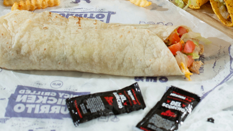 Del Taco burrito with Del Taco sauces