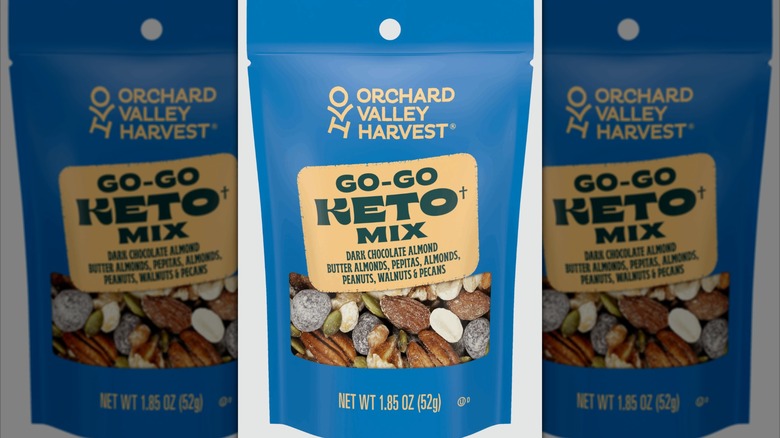 Bag of Orchard Valley Harvest Go-Go Keto Mix with clear window showing various nuts and seeds