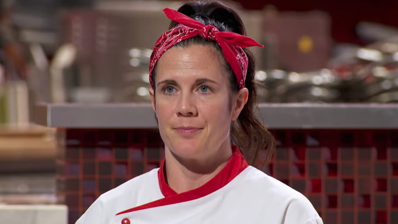 Female contestant on Hell's Kitchen wearing red bandana