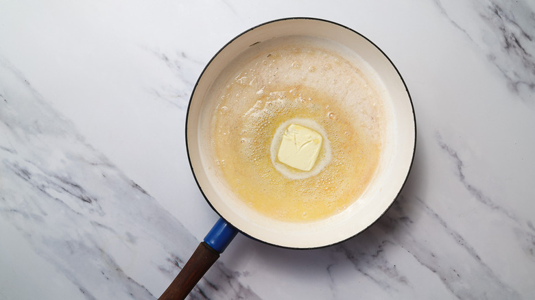 Butter melting in pan