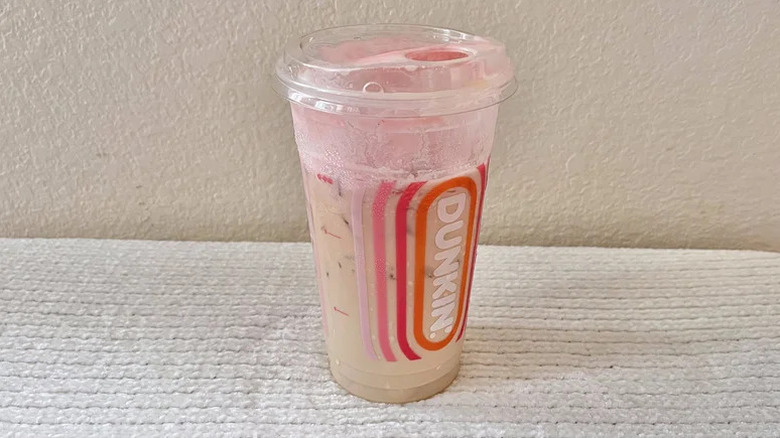 Strawberries n' Cream Cloud Dunkalatte on beige background