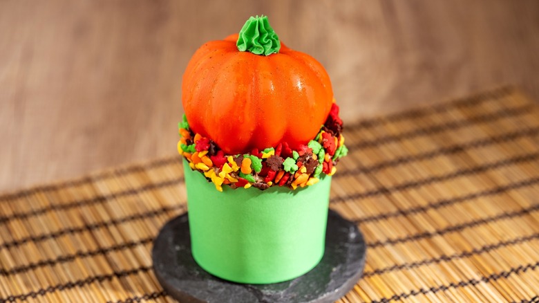 Pumpkin-Chai Cupcake with elaborate frosting in the shape of a pumpkin