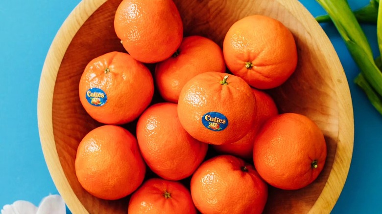 Cuties mandarin oranges in a wooden bowl