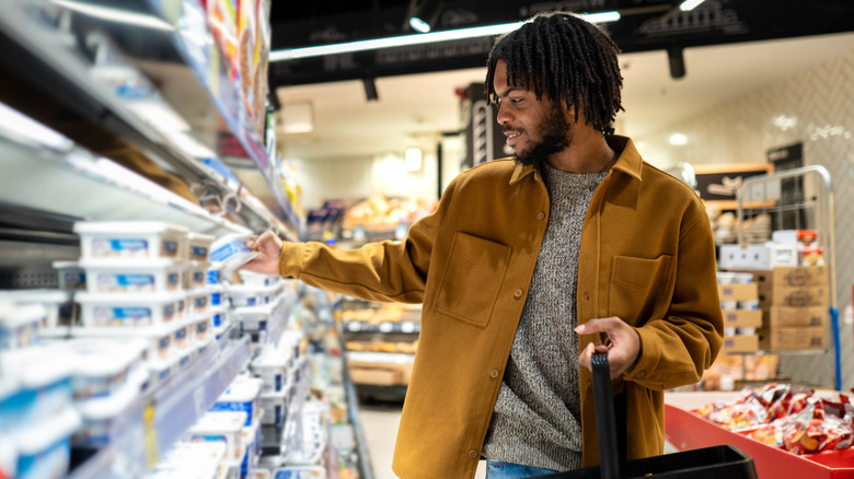 Foodie buying groceries at a supermarket