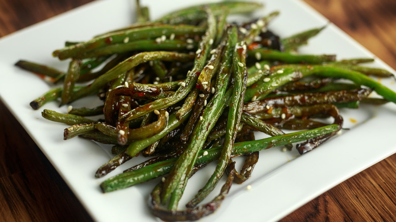 Plate of Din Tai Fung-style garlic green beans