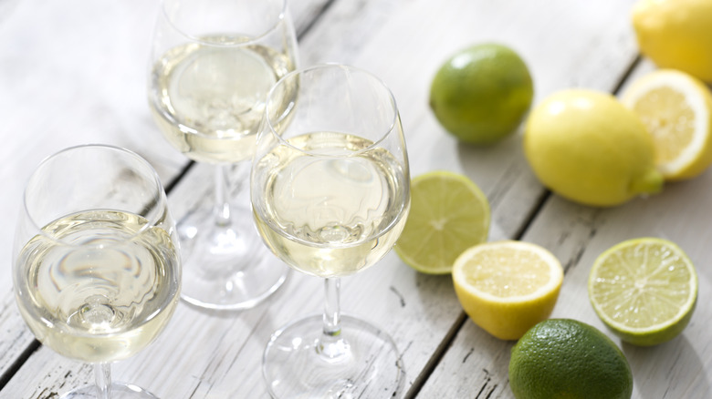 White wine with lemons and limes