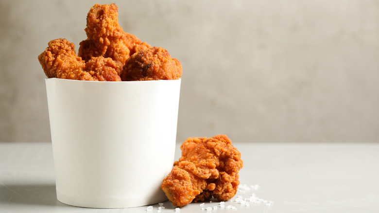 fried chicken in white bucket