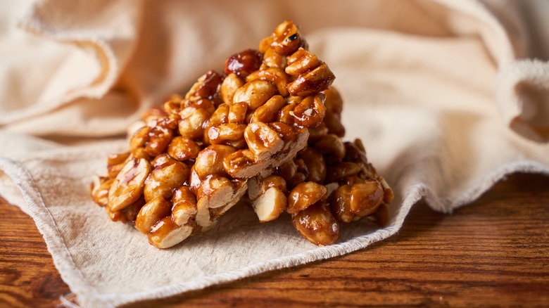 caramelized peanut candy on cloth background