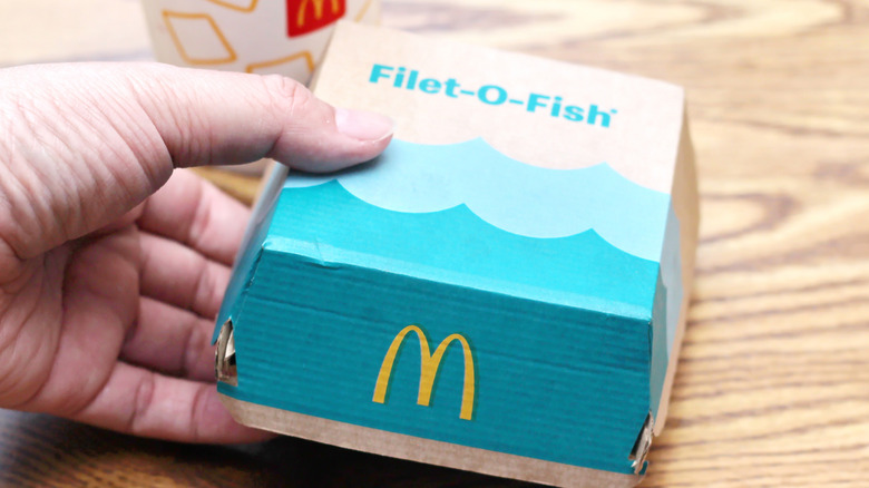Person holding McDonald's Filet o fish box