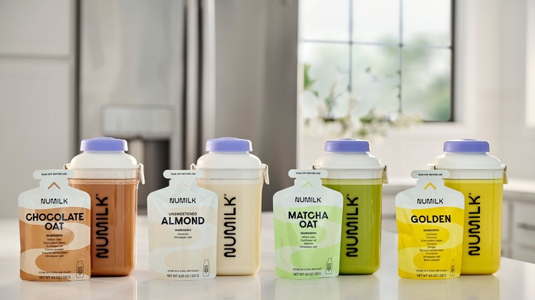 Four Numilk flavor profiles on a countertop