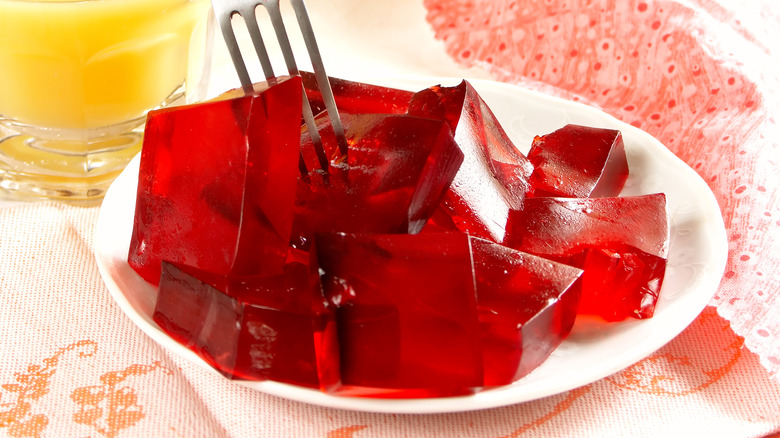 cubes of red Jell-O on a plate