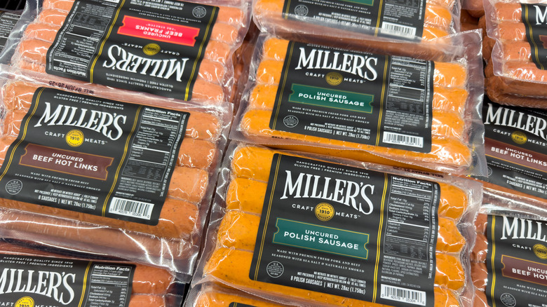 packs of Miller's hot dogs and sausages in store fridge