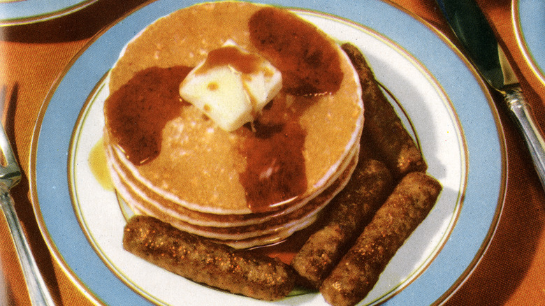 1955 illustration of pancakes and sausages