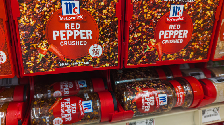 Grocery store display of McCormick crushed red pepper flakes