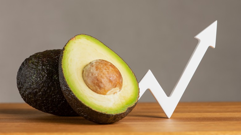 avocado sliced with arrow pointing up