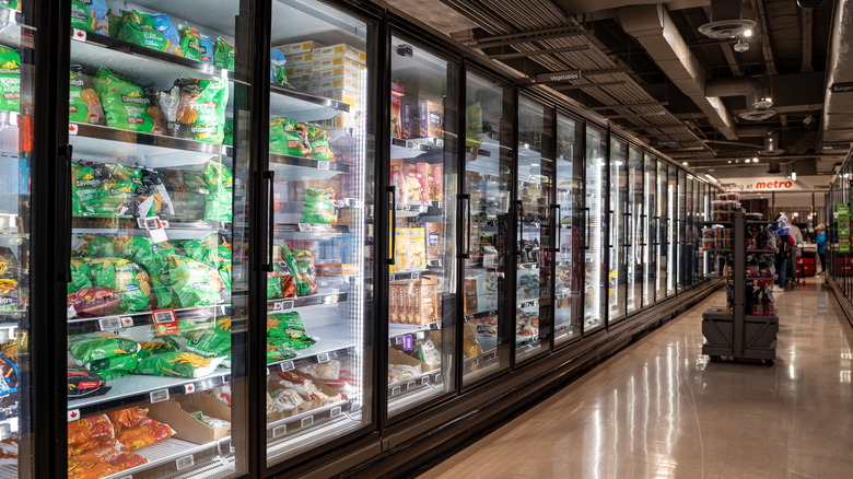 A frozen vegetable aisle in a grocery store