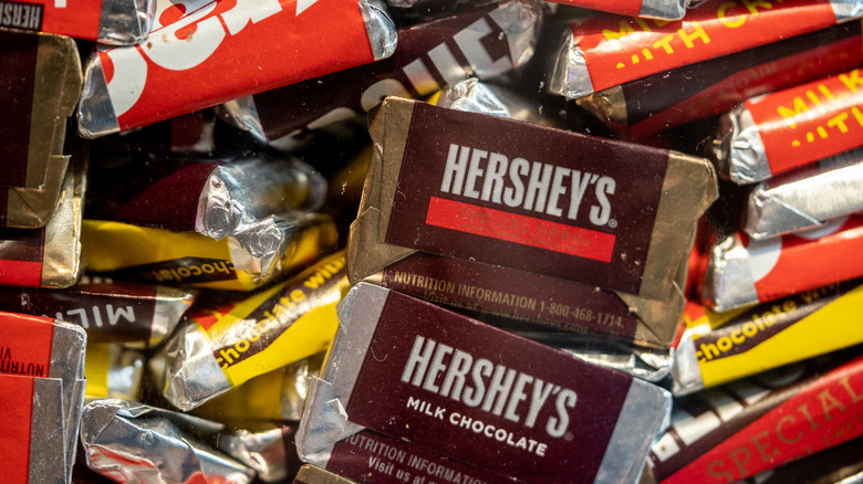 Scattered variety of mini Hershey's chocolate bars